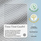 Gros plan sur le tissu gaufré Tencel issu de pâte de bois d’eucalyptus : anti-humidité, hypoallergénique, infroissable