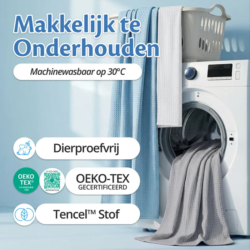 Grijze Ella Koeldeken bij een wasmachine, machinewasbaar op 30°C — OEKO-TEX gecertificeerd, gemaakt van TENCEL stof en dierproefvrij